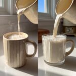 Split image showing creamy white hot chocolate being poured from a speckled pitcher into a beige mug and a clear glass mug.